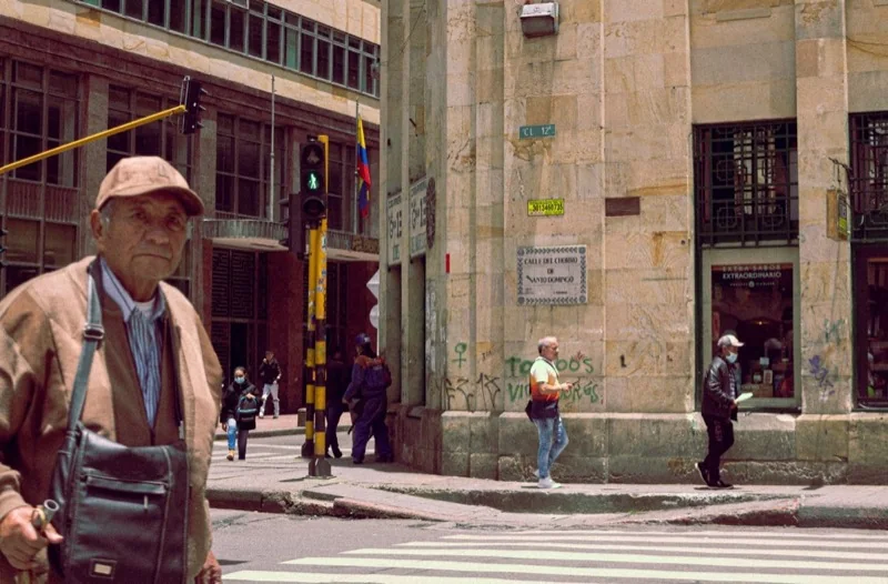 people walking on the side of the road — illustrative editorial photography, not a verified location