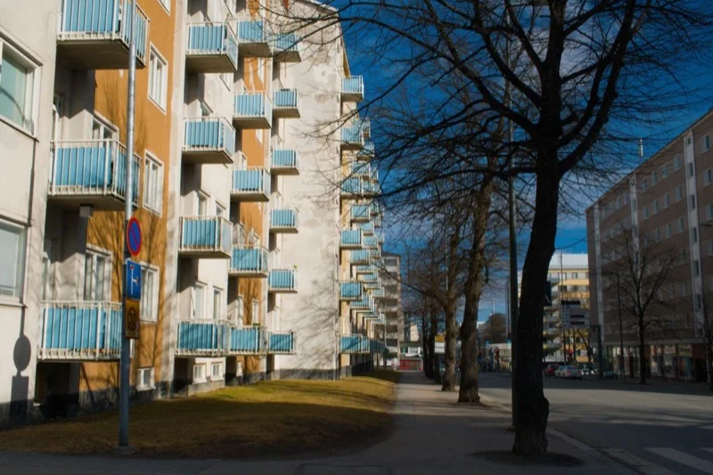 urban street view with apartment buildings in tampere — illustrative editorial photography, not a verified location