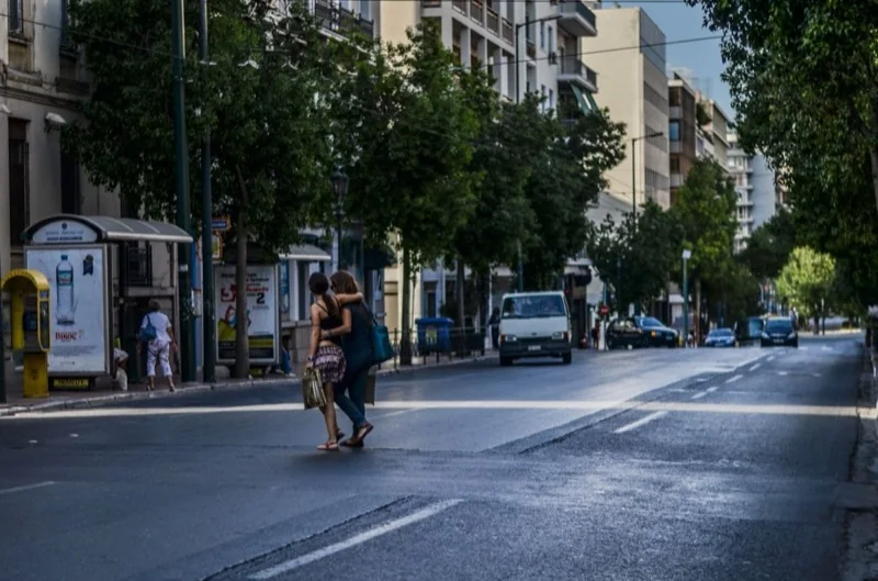 women walking on the street together — illustrative editorial photography, not a verified location