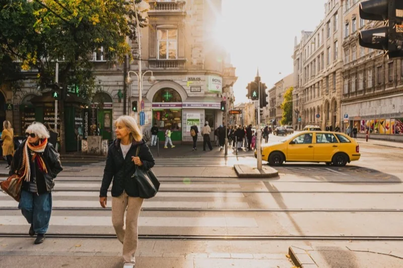 street scene in busy budapest intersection — illustrative editorial photography, not a verified location